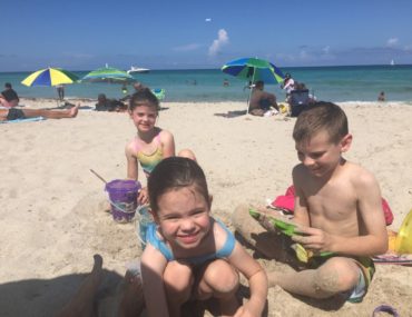 3 kids on the beach in Miami's south Beach