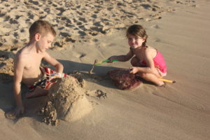 Kids playing on the beach at Hanauma Bay