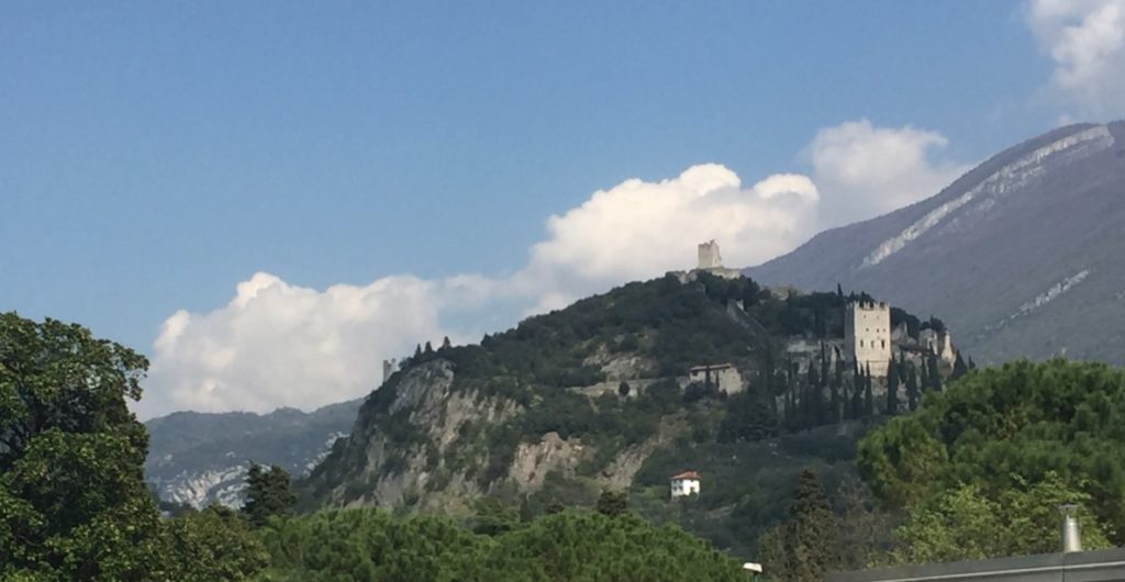 Italian Alps and castle on top of a hill near Bolzano Italy