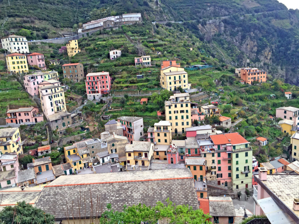 building on the cliffs on Riomaggiore in Cinque Terre, Italy