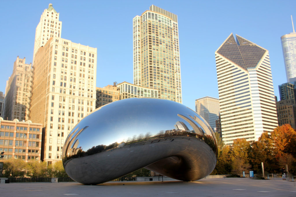 a silver sculpture called cloud gate in Chicago