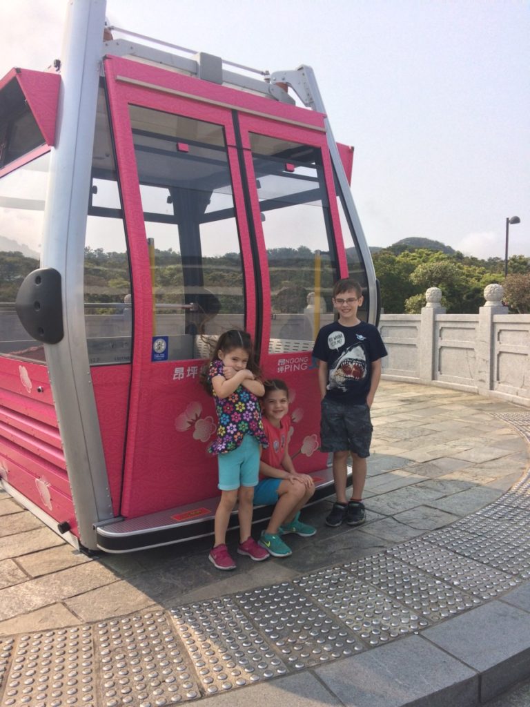 3 kids near the ngong Ping cable Car