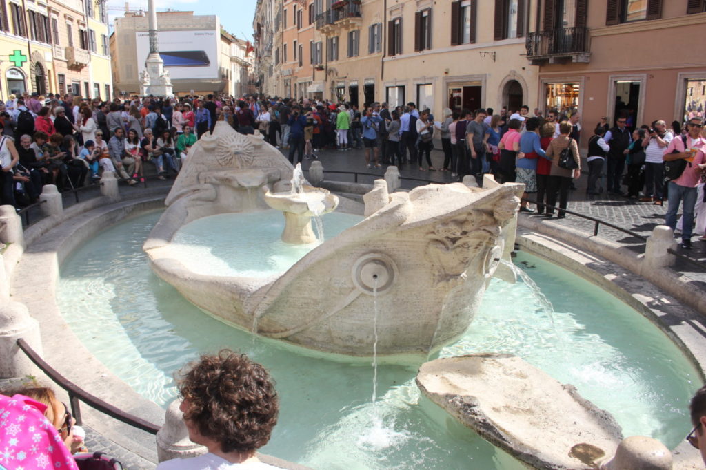 Fountain memorial at the base of the Spanish steps in Rome, Italy 