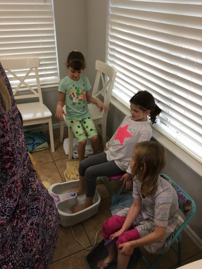 Young girl get a foot bath at a Spa Birthday Party