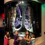 a Massive geode with purple sparkling interior at the Perot Museum