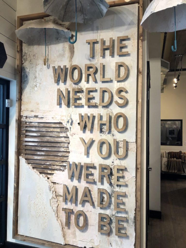 The world needs who you were made to be. Sign at Magnolia Market