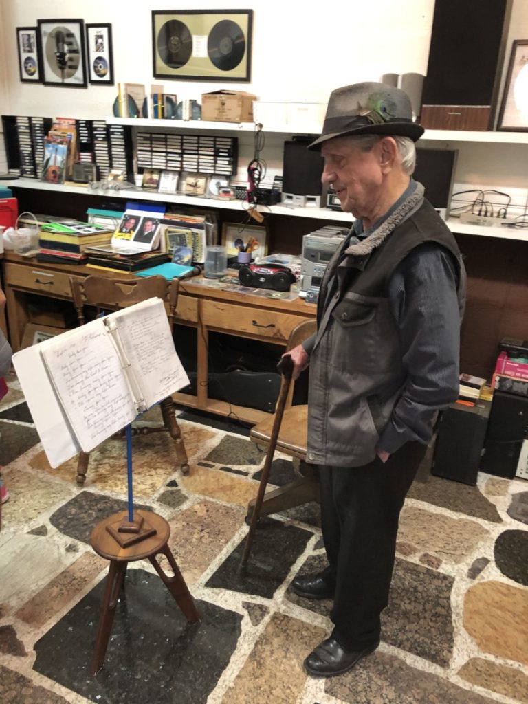 94-year -old Mr. Johnson at Johnson's Rock shop Music Room in Livingston, Texas