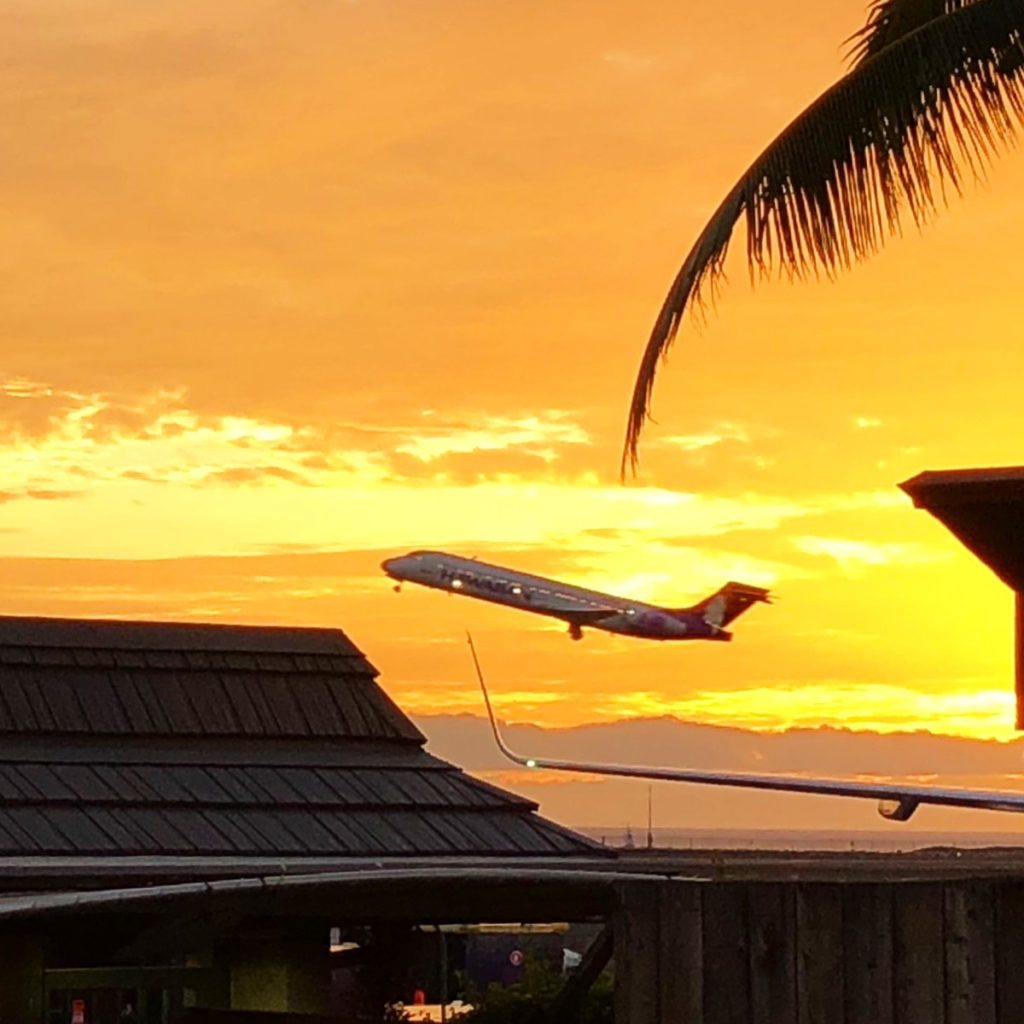 Hawaiian Airlines flight in a Yellow Sunset