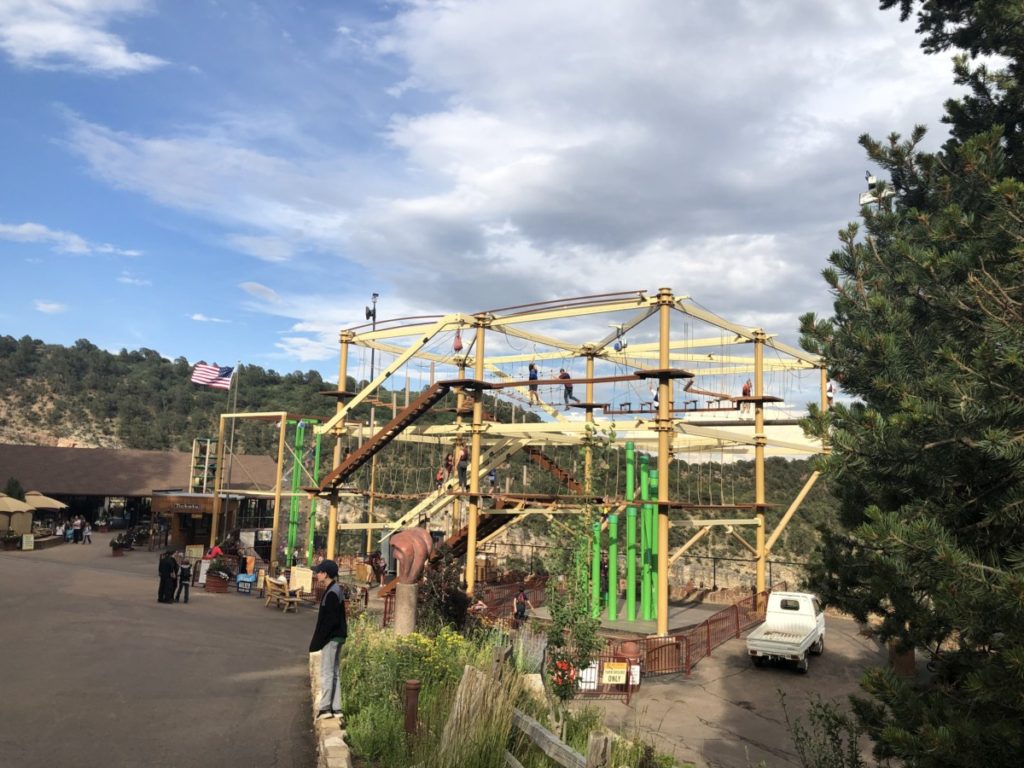 The ropes course, climbing wall and ticket office outside Cave of the Winds
