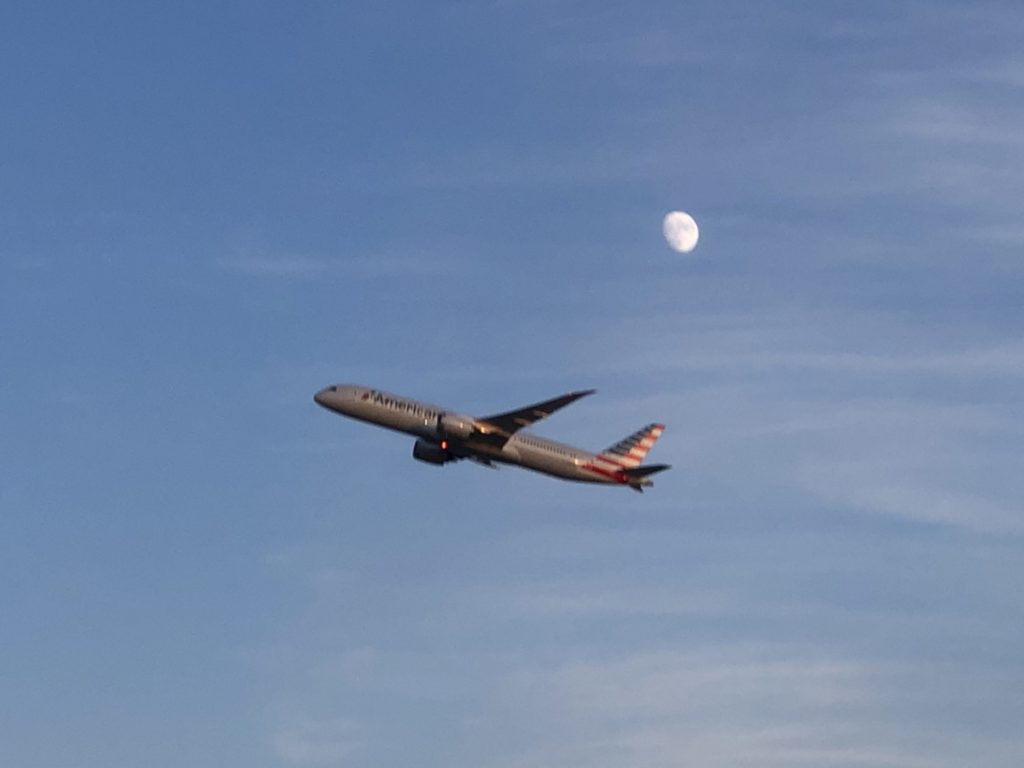 American Airlines Airplane flying near the moon