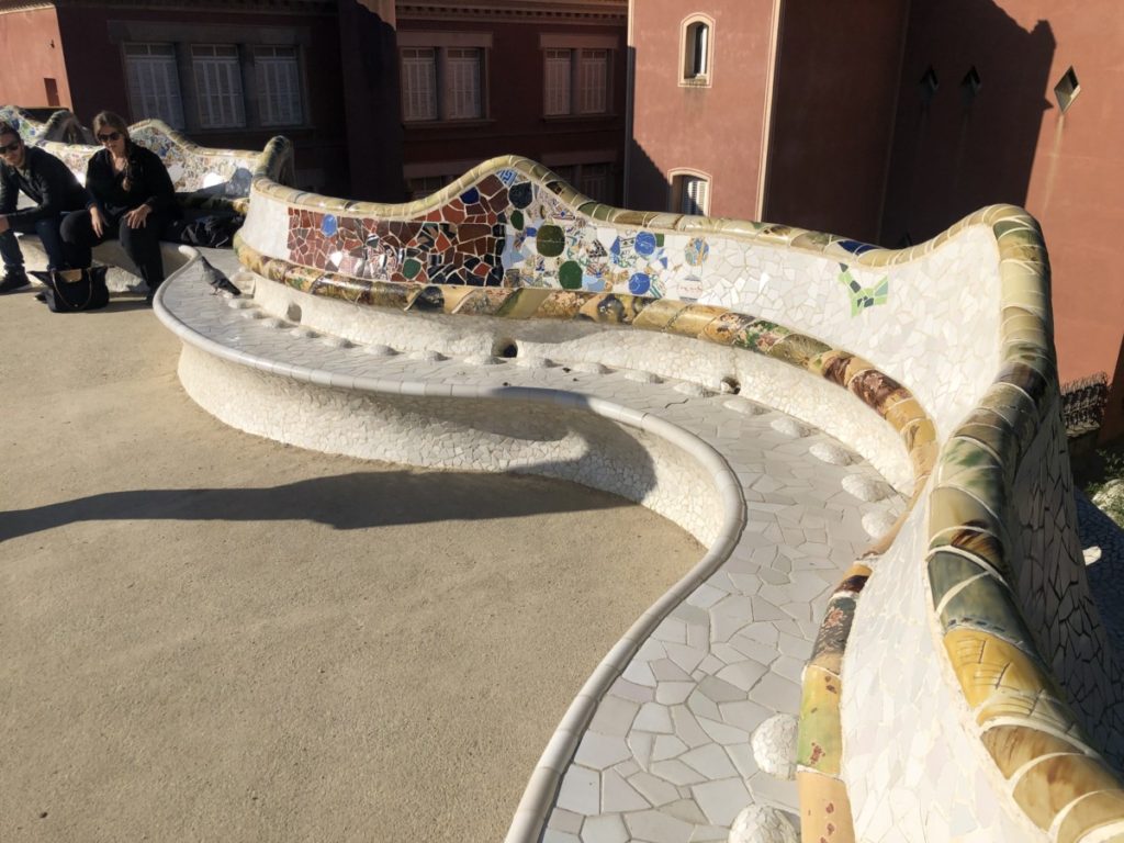 curvy wall and bench at the overlook of Park Guell