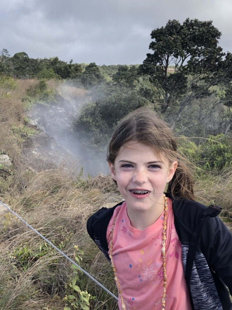 Girl at Steam vents at Volcano National Park in Hawaii