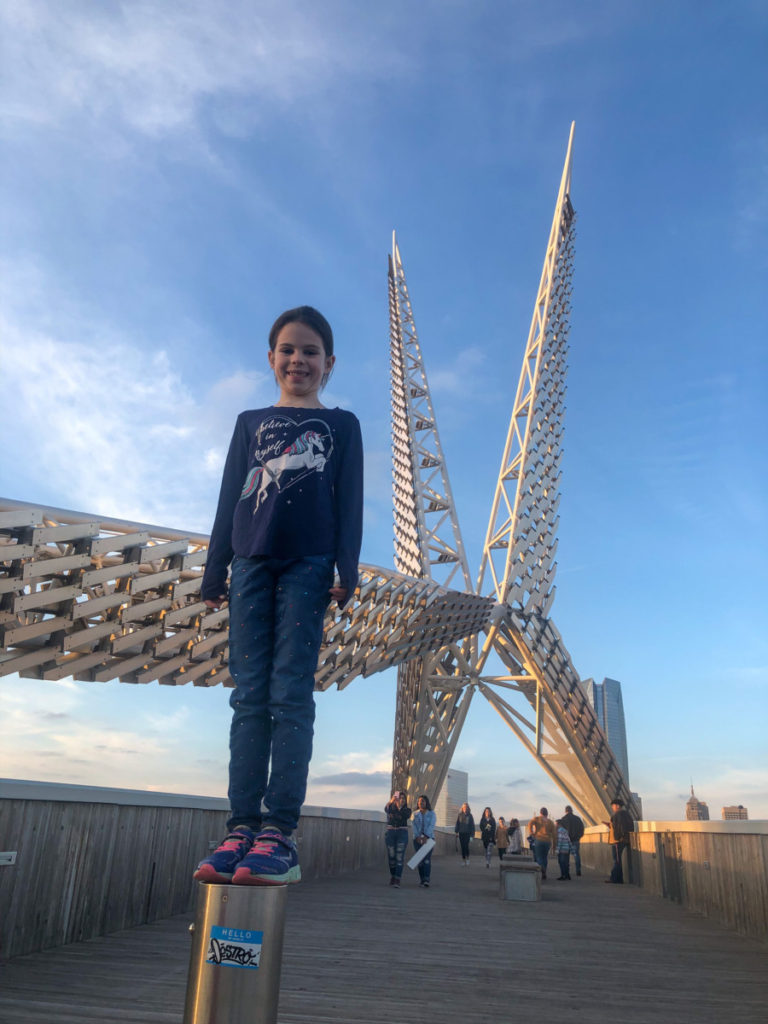 Young girl with the Scissortail structure in Oklahoma City, OKC