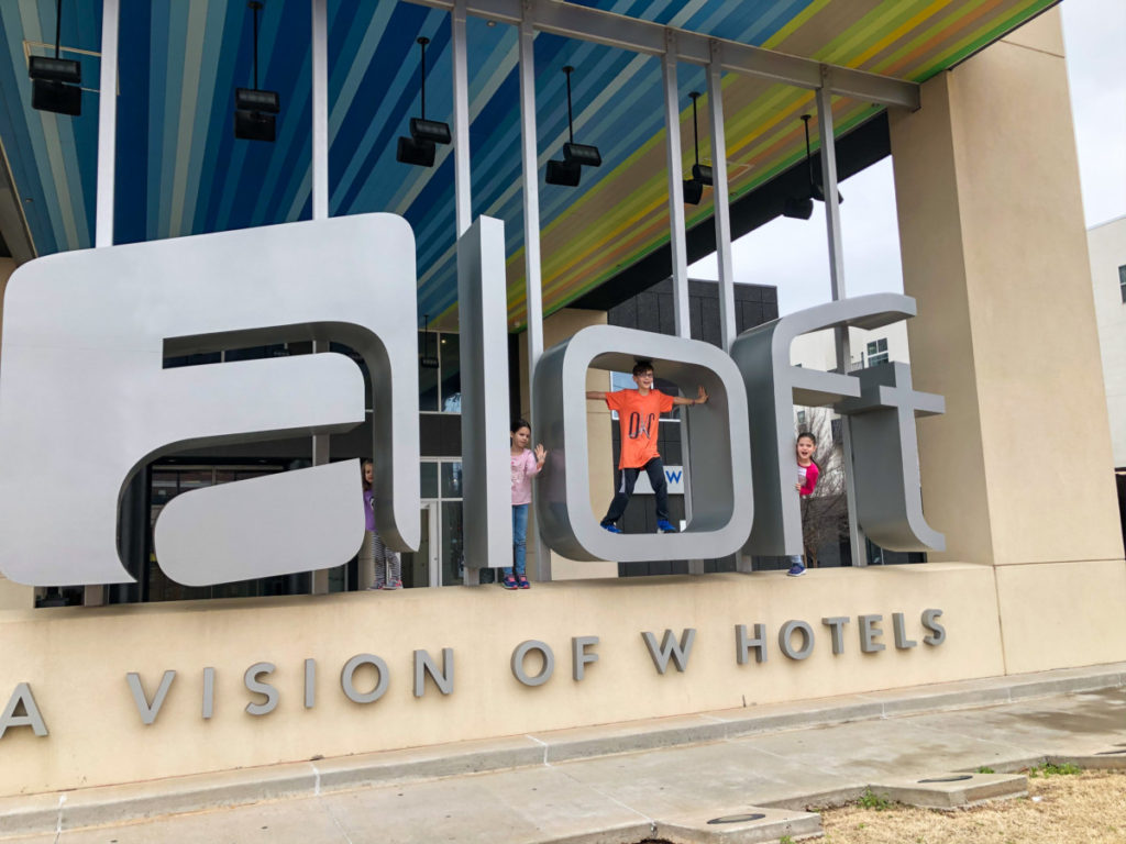 4 kids at Aloft Hotel front in Oklahoma City