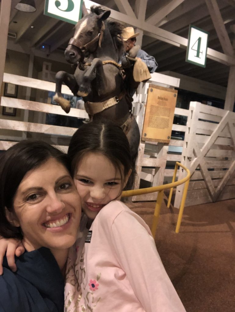 A girl and her mom in the Rodeo exhibit at the National Cowboy and Western Museum in Oklahoma City