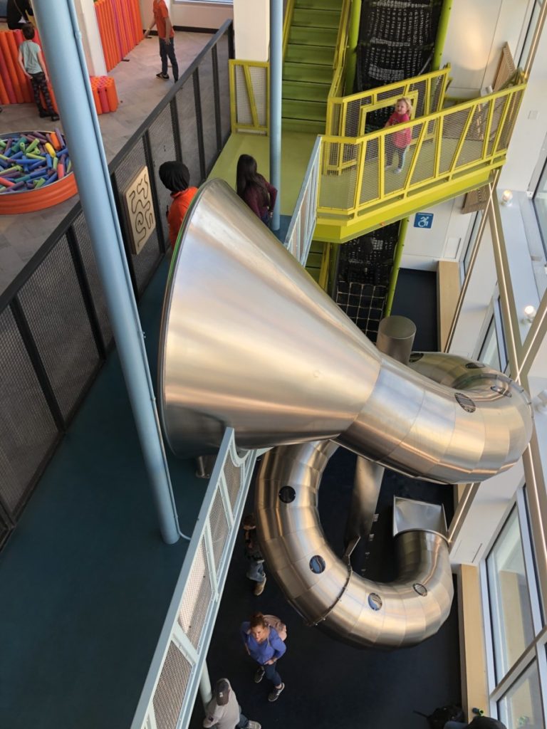 3 story Curly metal tube slide at the Minnesota Children's museum in St. Paul