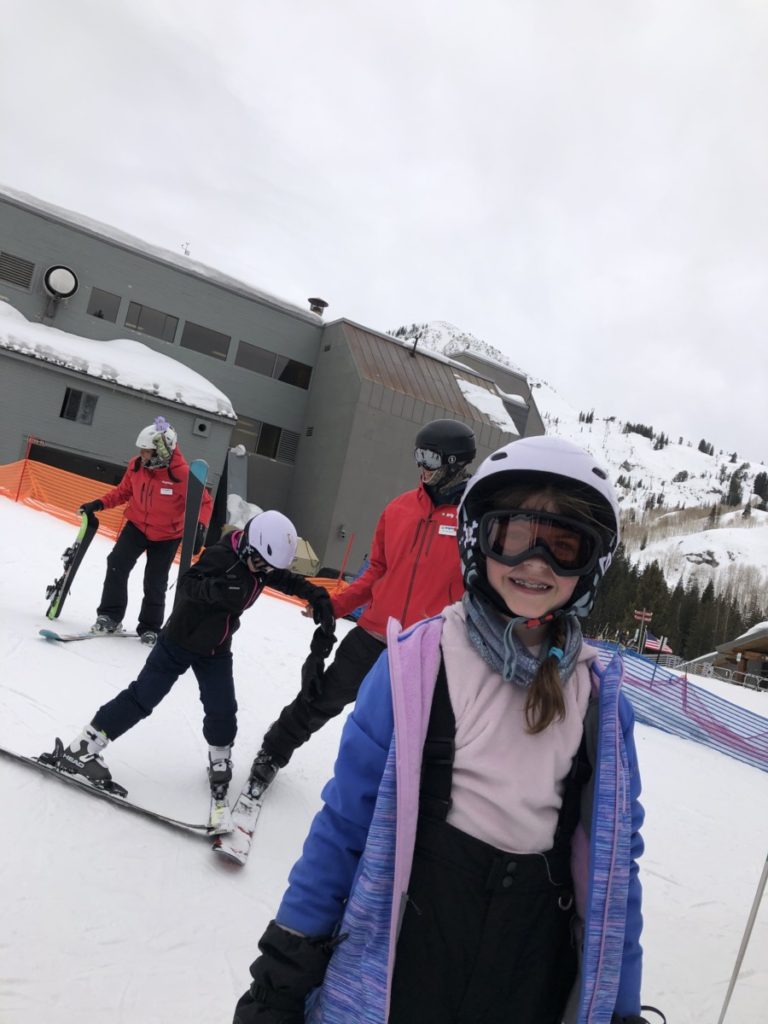 Girl Smiles on the bunny hill at Brighton Ski Resort