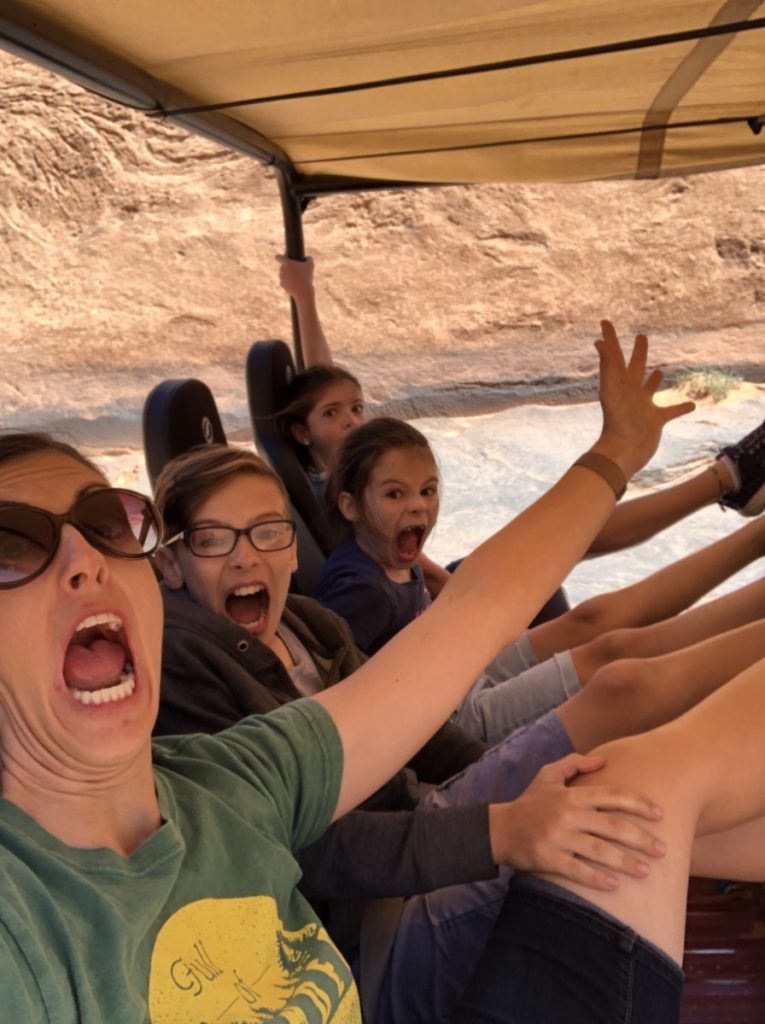 Mom and 3 kids scared on the Hummer safari Tour from Moab Adventure Center