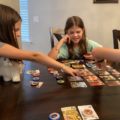3 kids playing family games splendor
