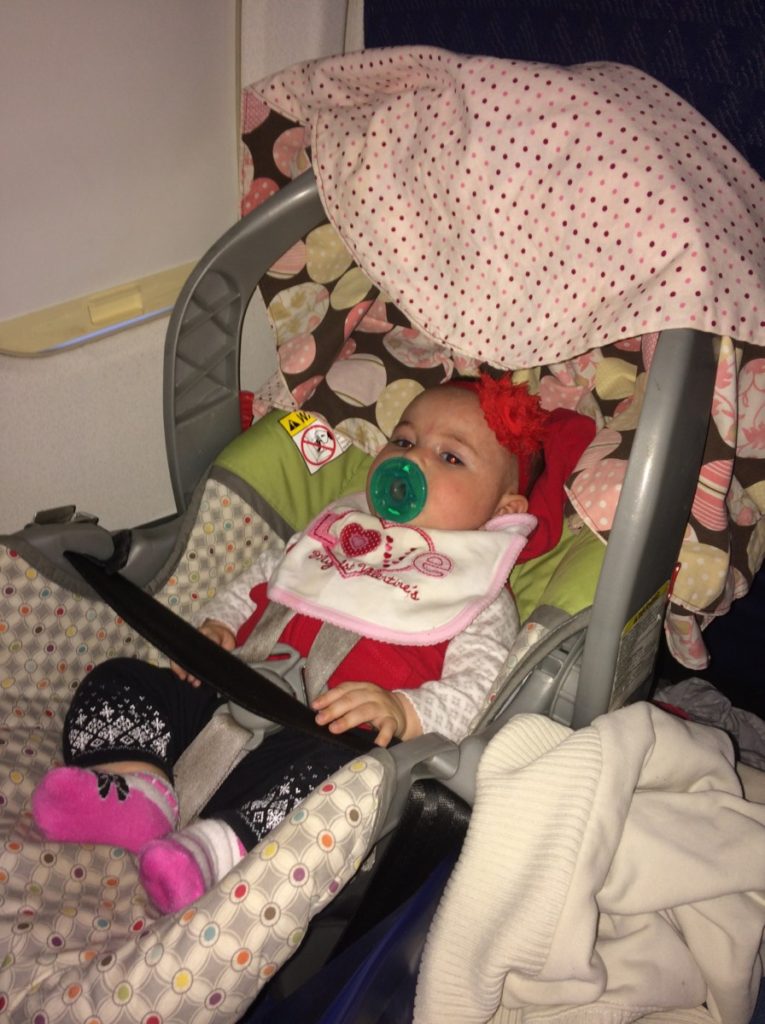 Baby in Car seat on the Airplane