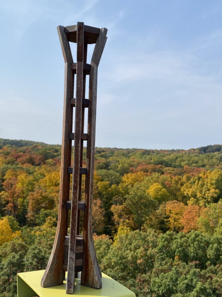 Miniature Tower above the fall-colored trees from the Tower platform at the Holden Arboretum