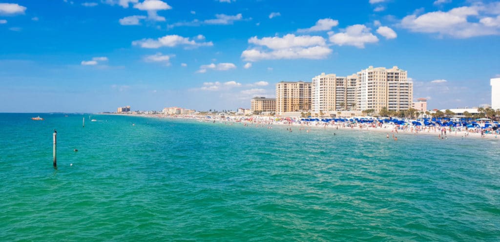 Green and Blue waters looking to the high rides on Clearwater Beach in Florida