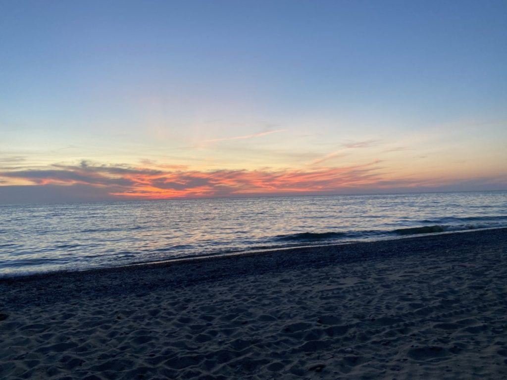 sunset on the Oval Beach in Saugatuck Michigan