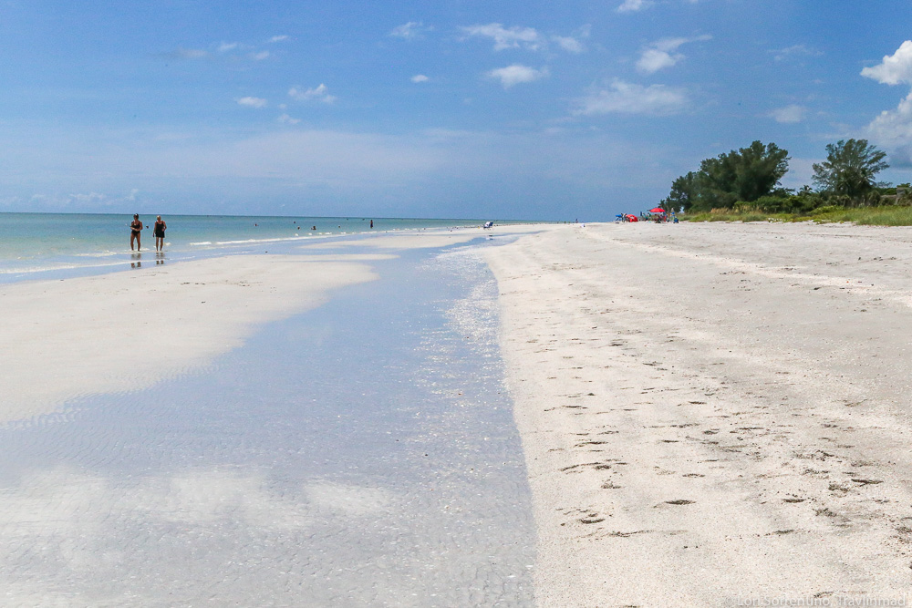 where the water meets the sand at Sanibel Lighthouse Beach
