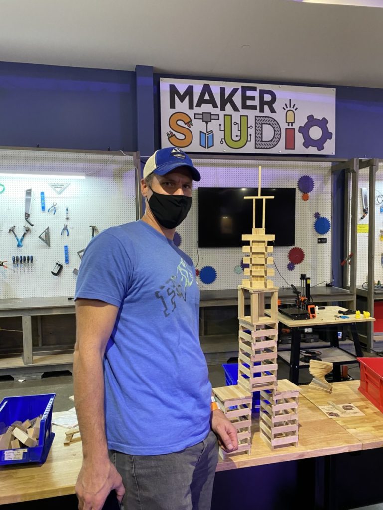 Dad builds epic eiffel Tower with kiva blocks at the sci-tech museum in Frisco with kids