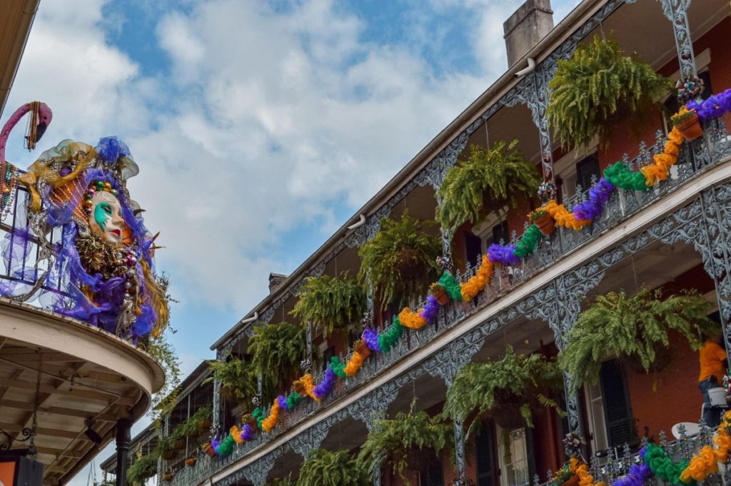 Plants and decor hanging on Front Street in New Orleans, Louisianna where couples can walk on their anniversary trip