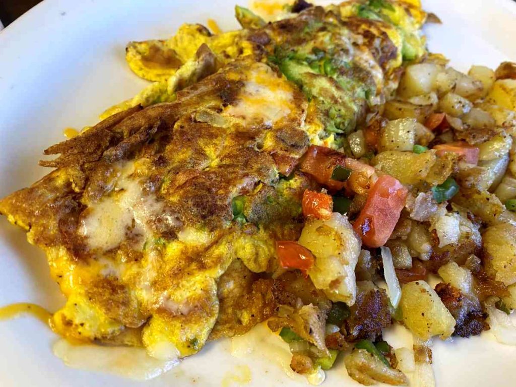 Dumplin's Y Amigos Omelet and hashbrowns