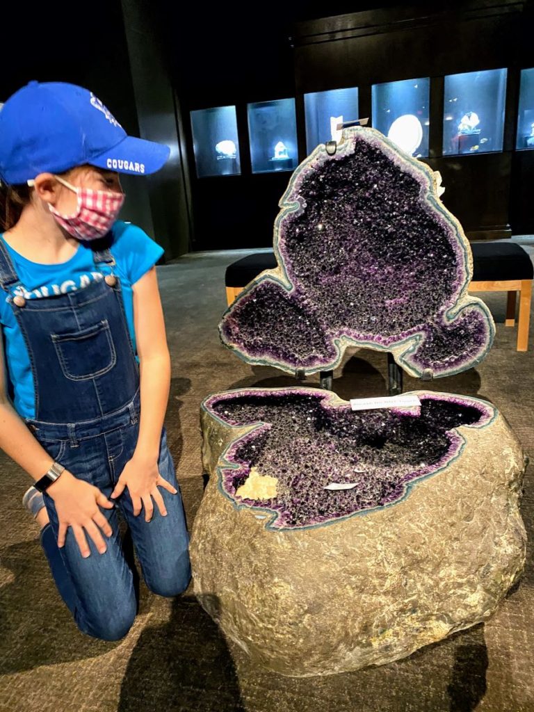 Girls looks at the Giant Geode at Petroleum Musuem, Midland, Texas