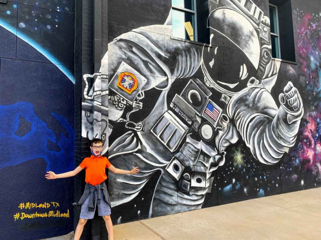 boy at the Midland Library Astronaut Mural