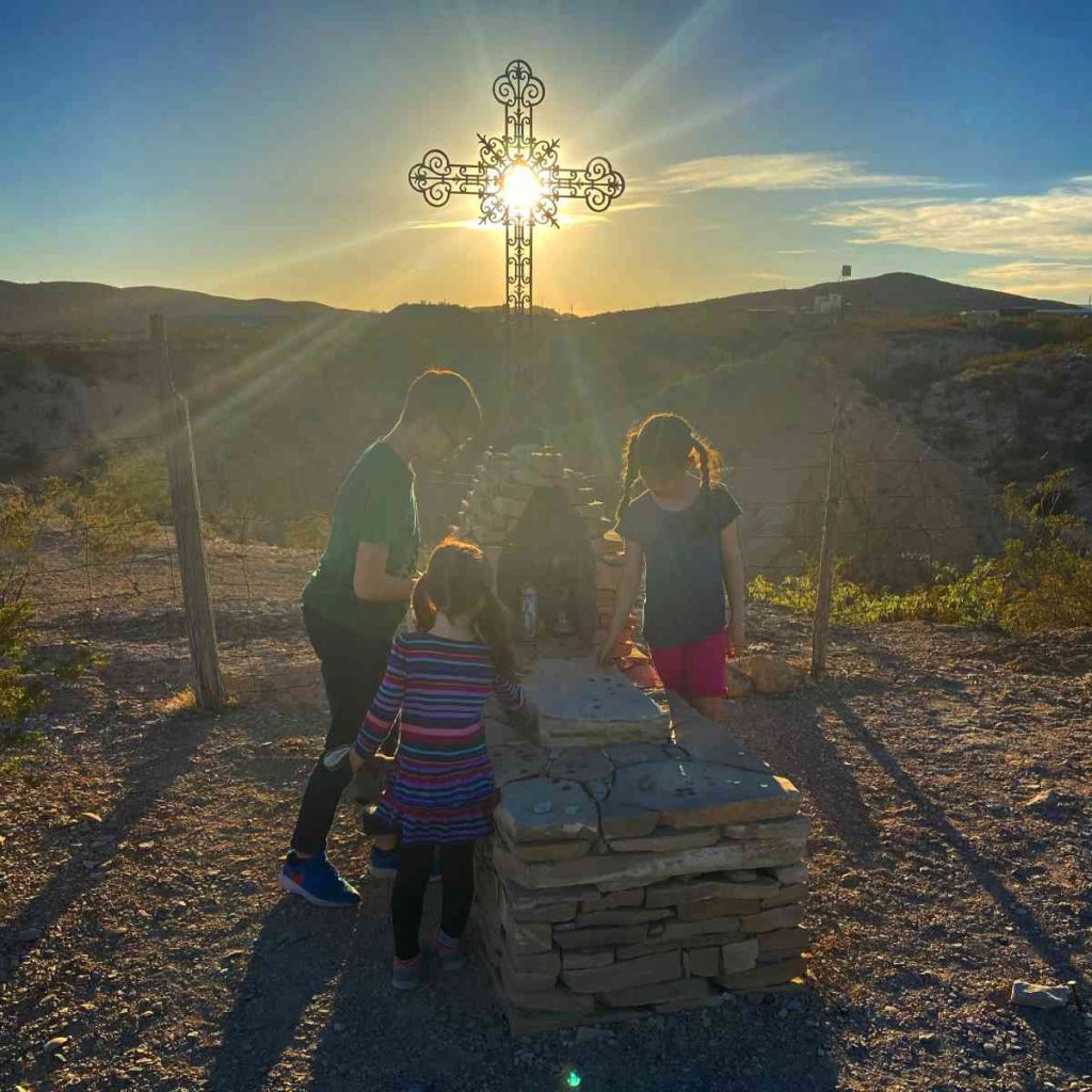 sun in the cross at Terlingua cemetery in West Texas