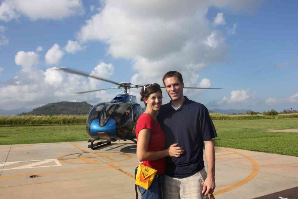A couple prepares for a Helicopter tour on Kauai