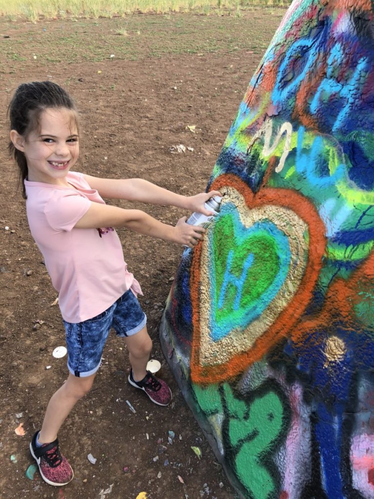 Kids Spray Paint at Cadillac Ranch Amarillo